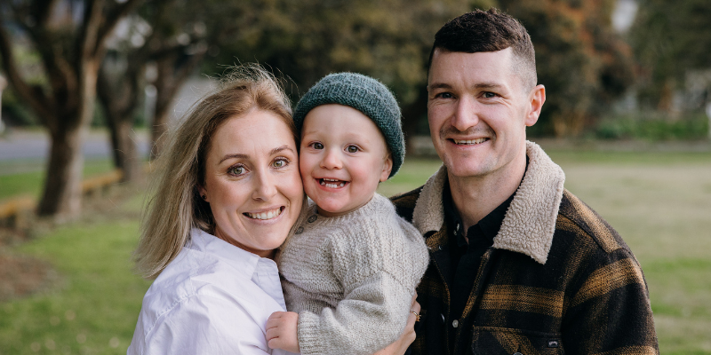 Mum, Julia, and Dad, Fergus, holding Ardie.